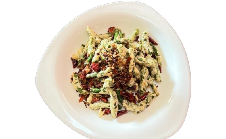 Стручки фасоли в пряно-остром соусе