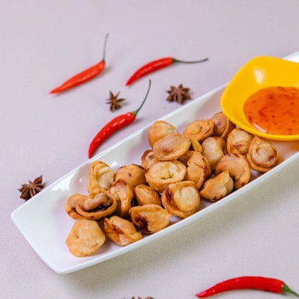 Пельмени жареные с соусом